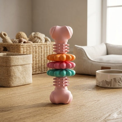 Jouet pour chien os rose anneaux orange turquoise salon lumineux