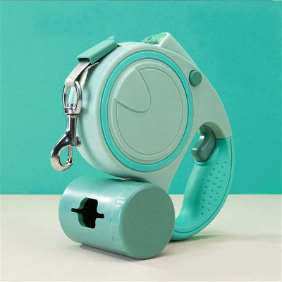 laisse a enrouleur pour chien retractable verte avec poignee ergonomique crochet metalique et distributeur de sacs integre