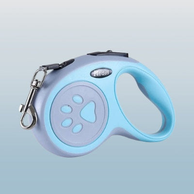 laisse enrouleur chien bleu clair avec poignee ergonomique motif patte et mousqueton metalique