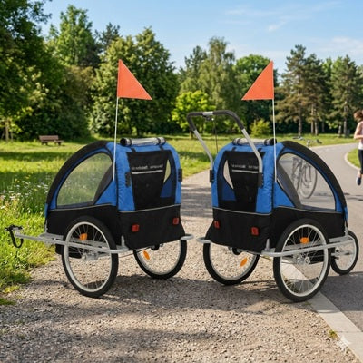 remorques vélo chien duo bleue noire piste cyclable parc comparaison